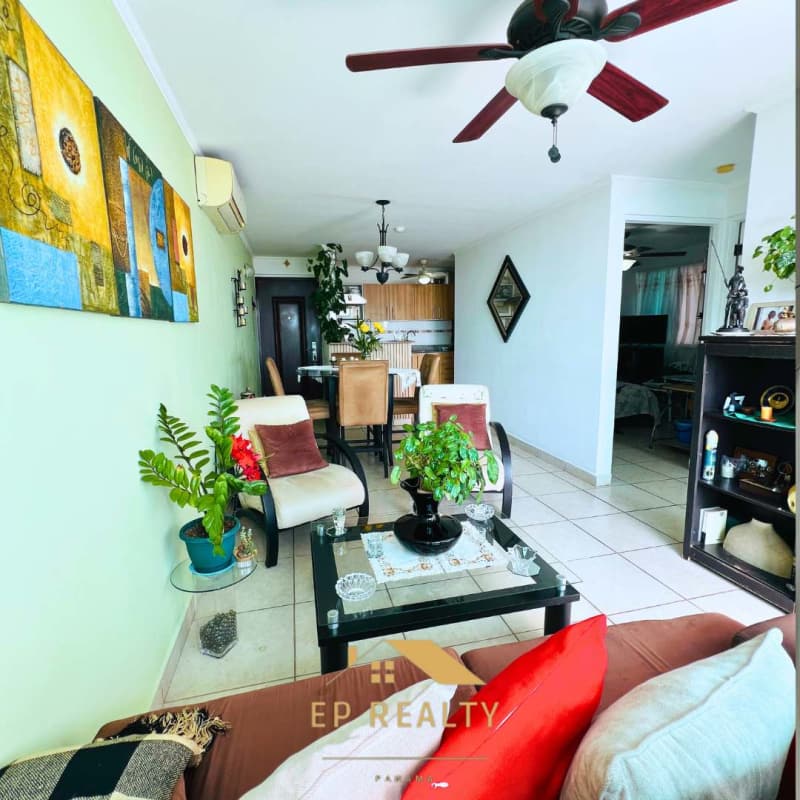 Bright living room with ceiling fan, ceramic floors and balcony in PH Villa Parque Parque Lefevre Panama