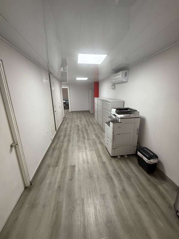 Spacious meeting room with chairs table TV in Juan Diaz warehouse Panama