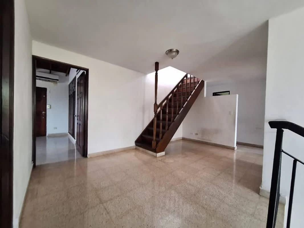 Large kitchen with wooden cabinets, granite counters, appliances in El Dorado Panama