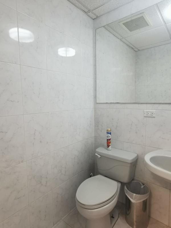 Open corporate office area with modern ceiling and blue carpet World Trade Center Panama