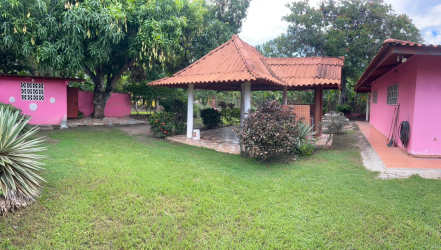Outdoor pool with garden and bohio at Las Lajas house near Coronado Panama