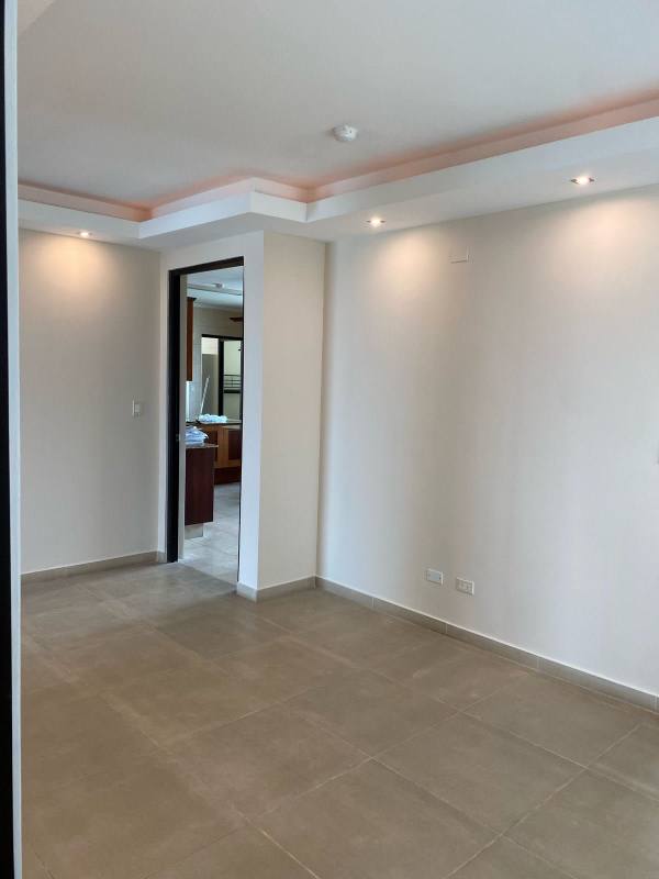 Luxury bathroom with marble tiles, double vanity, glass shower in PH Ocean Drive Punta Pacifica Panama