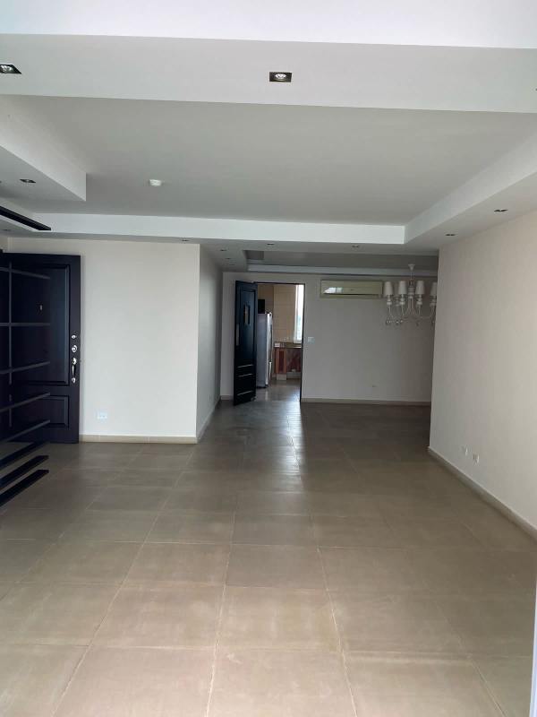 Master bedroom with floor-to-ceiling windows and Pacific Ocean view in PH Ocean Drive Panama City