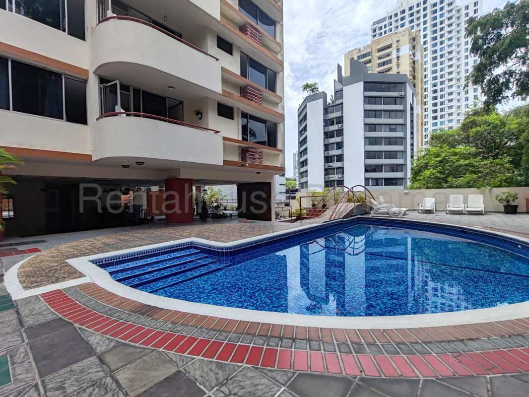Bright bedroom ceiling fan closet large windows skyline view apartment El Cangrejo