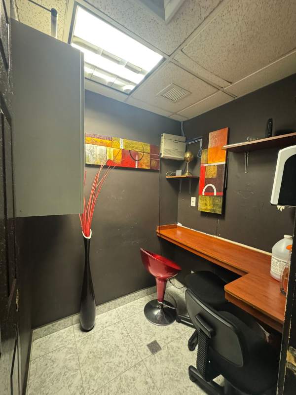 Grand lobby entrance of World Trade Center Panama with pillars and glass facade