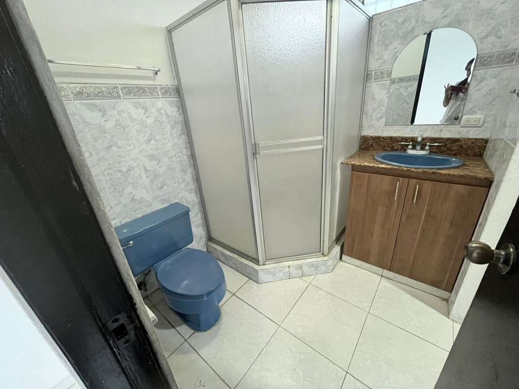 Exterior front of duplex with covered parking, security gate in Limajo Panama