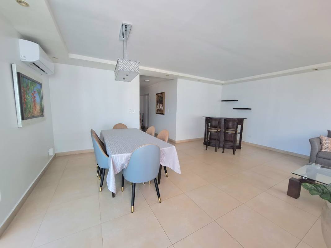 Fully equipped kitchen with granite counters and wood cabinetry in PH San Francisco Bay Panama City