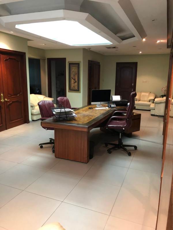 Reception lobby with desk and seating in PH Omega office for rent Panama