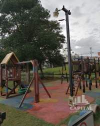 Outdoor exercise equipment fitness zone shaded community park Panama Oeste