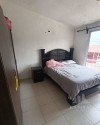 Open kitchen granite counters cabinets tile backsplash Residencial Aragón Arraiján Panama