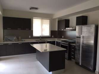 Elegant modern bathroom vanity with vessel sink in River Valley Panama Pacifico