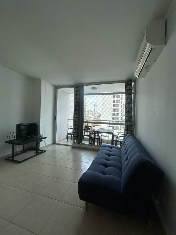 Living room with balcony city view furnished apartment PH El Cangrejo Tower Panama