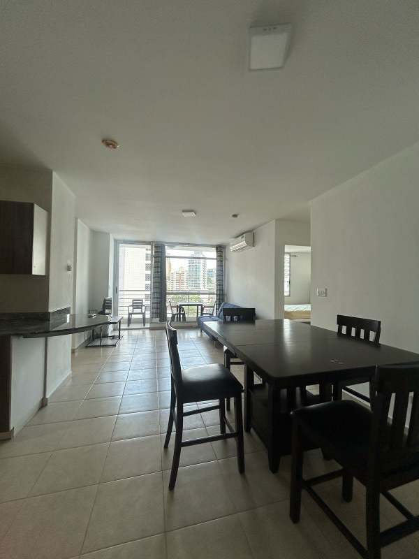 Furnished living and dining area with balcony El Cangrejo Tower Panama City