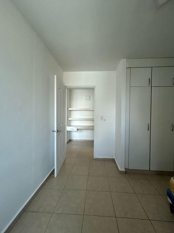 Bedroom closet shelves tile flooring PH El Cangrejo Tower Panama City Panama