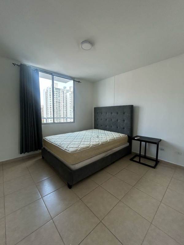 Bedroom with large window city view and AC PH El Cangrejo Tower Panama