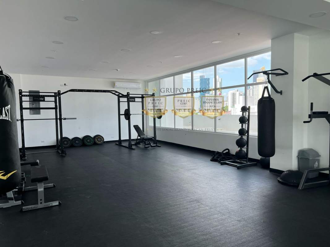 Modern kitchen with appliances and dining area PH Botánico Panama