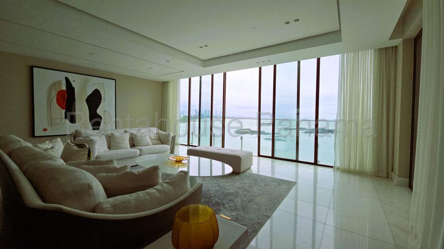 Master bedroom with ocean view balcony, marble floors at PH Pacific Point Punta Pacifica Panama