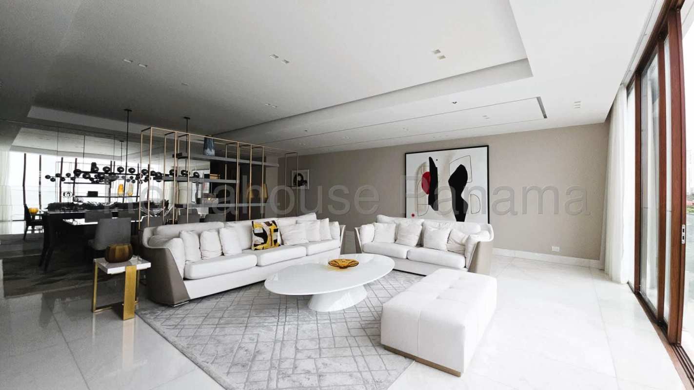 Gourmet kitchen with marble counters, island and appliances at PH Pacific Point Punta Pacifica