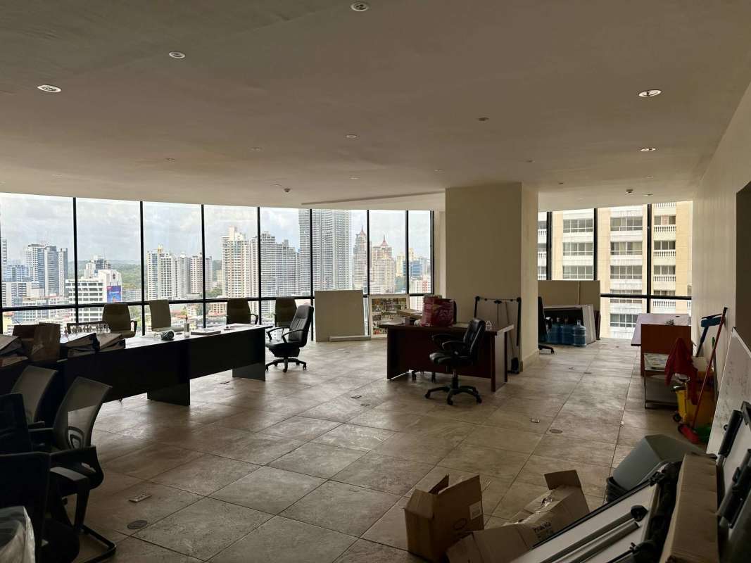 Executive private office space with glass walls and city views in Torre Generali Panama City