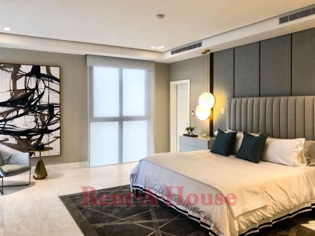 Spacious master bedroom with large windows and breathtaking ocean views PH The Residences Punta Pacifica Panama