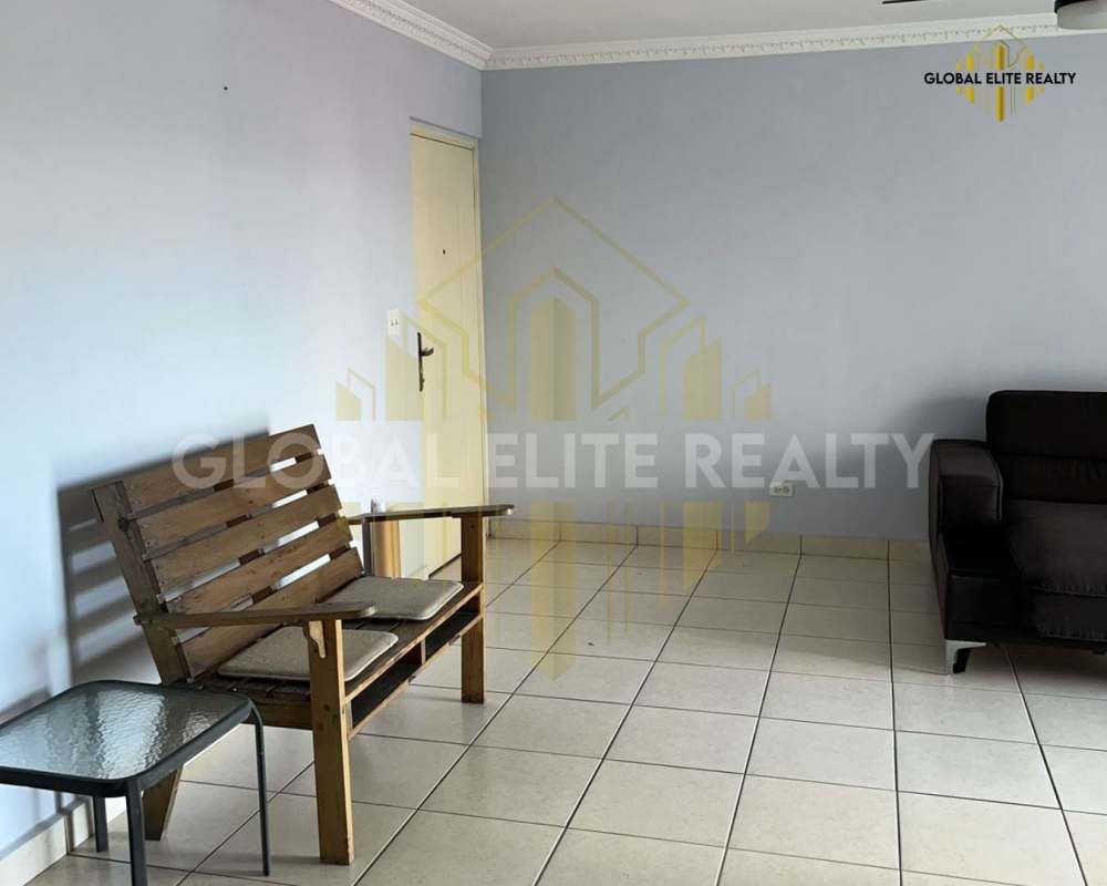 Spacious living room with sliding doors to balcony, tiled floor, PH Hato Pintado Central Panama City