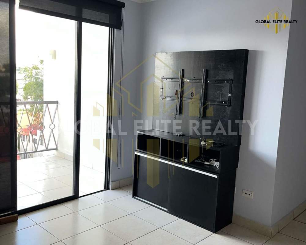 Bedroom featuring big window, air conditioner, tiled floors in rental PH Hato Pintado Central Panama