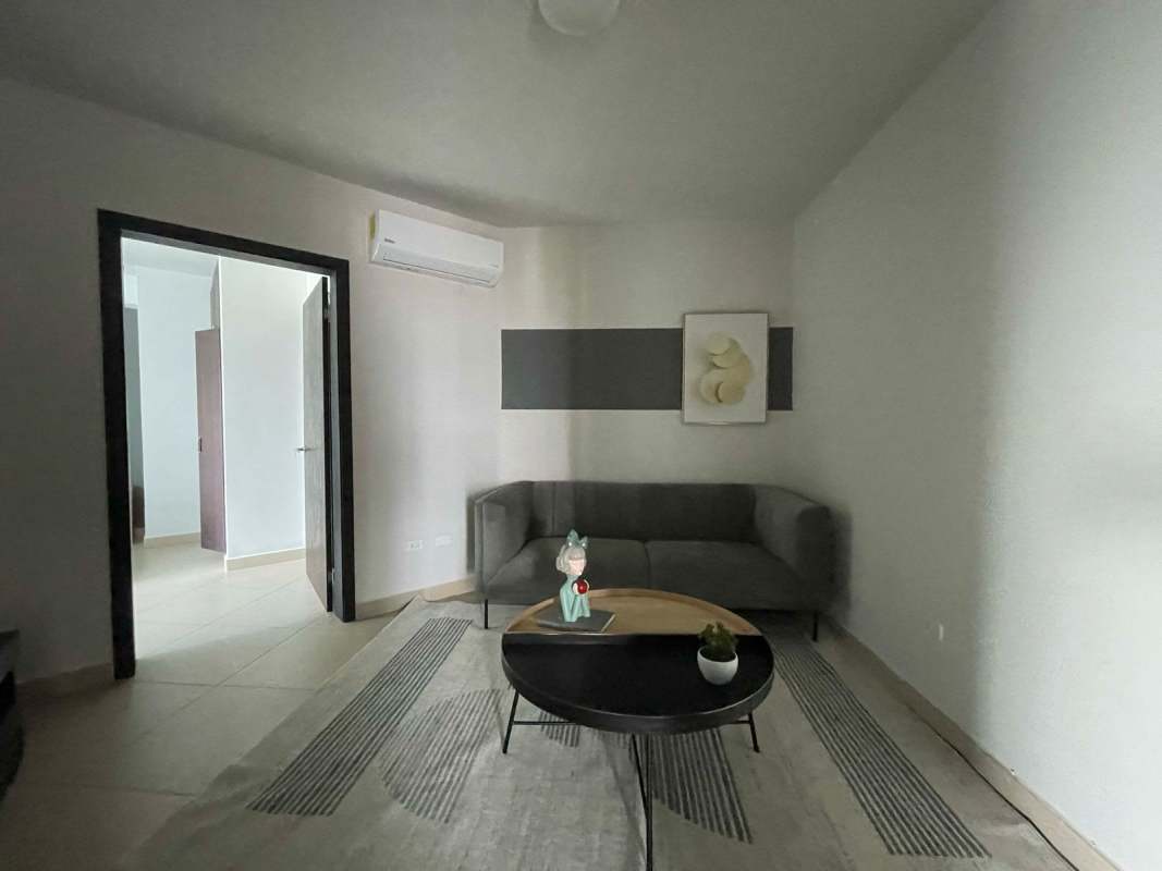 Dining area with ocean and city views, elegant furnishings in PH Oceanview Residence Costa del Este Panama