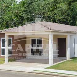 One-level modern house with front porch, carport, green lawn in Costa Verde Residential Panama