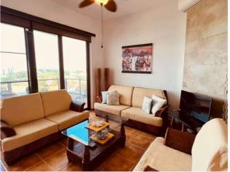 Bright living room with sofas and ocean view balcony Villa Azul Playa Blanca Panama