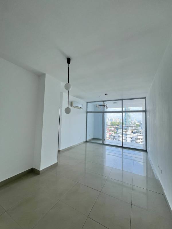Modern living room with floor-to-ceiling windows and city view at PH Famagosta Loft San Francisco Panama City