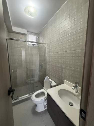 Contemporary kitchen with granite countertops and stainless appliances PH Metropolitan Park