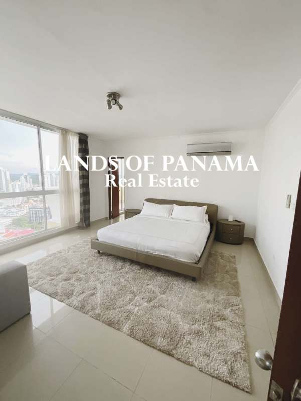 Master bedroom with terrace access and city view in PH Obarrio penthouse Panama City