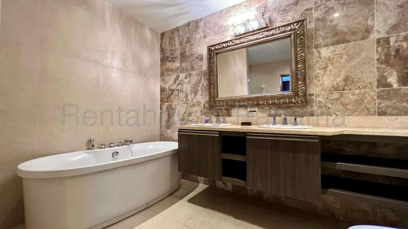 Contemporary remodeled kitchen with induction cooktop and stainless appliances in PH Rivage Tower