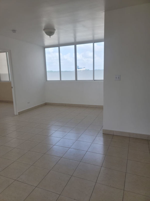 Unfurnished bright living room tiled floors and windows Plaza Edison Panama City