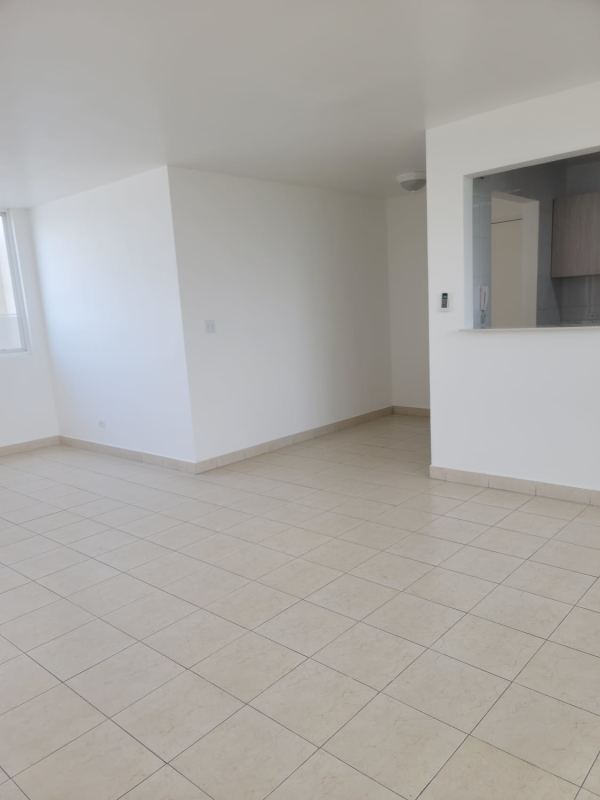 Open living space connected with kitchen bright ceramic floors Edison Park Panama