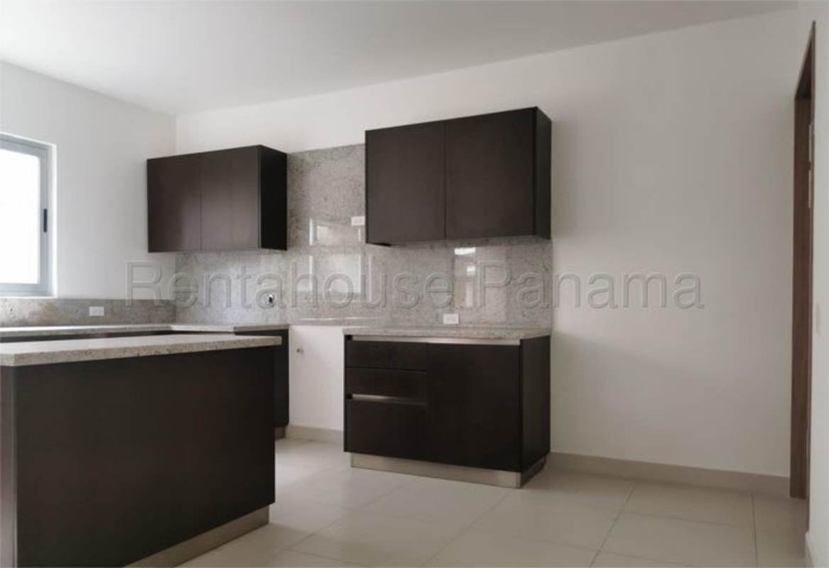 Spacious bedroom with sliding windows, natural light, ceramic flooring Altos de Panamá