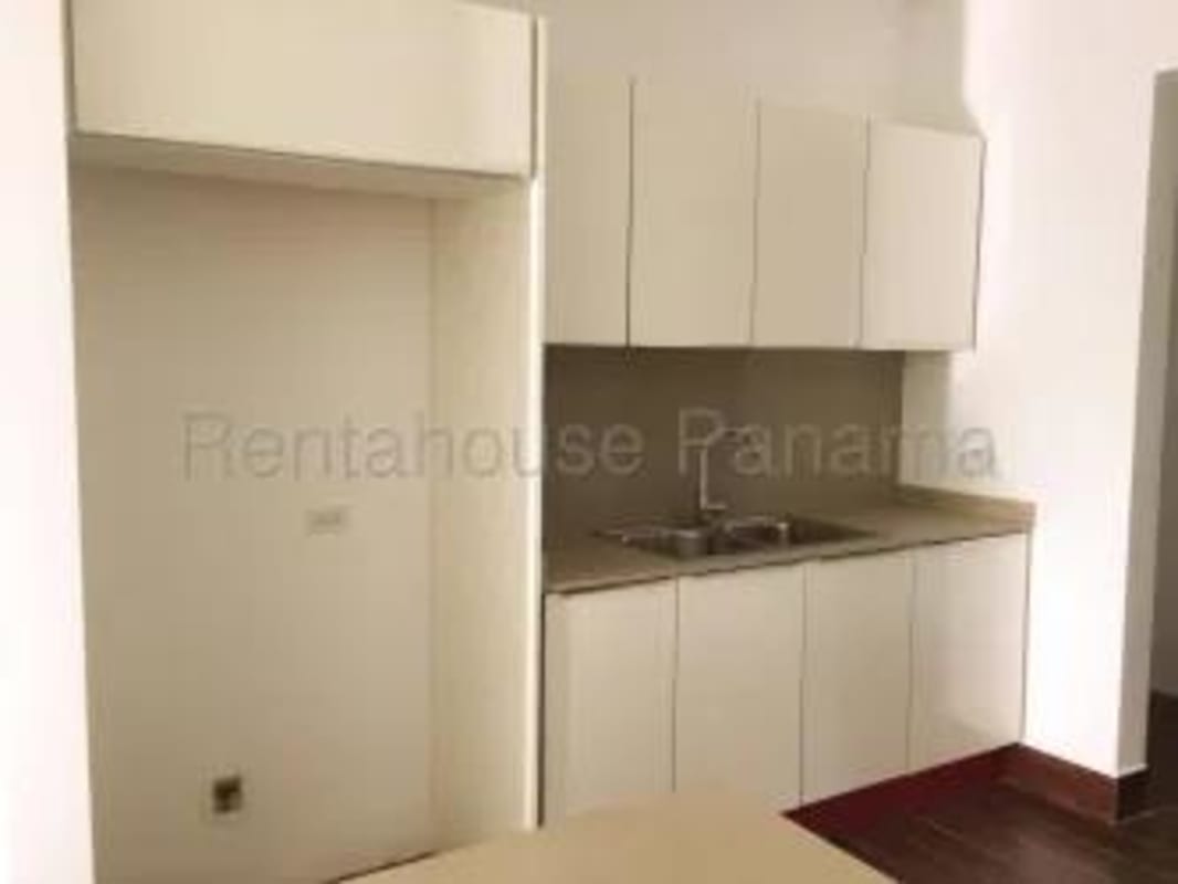 Bedroom with wood floors, closet and natural light in Panama rental apartment Costa Sur