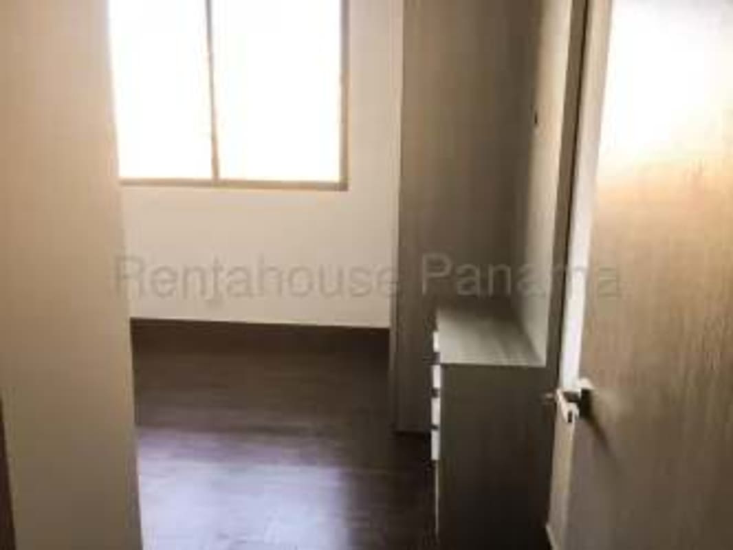 Built-in closet with shelves and drawers in bedroom Costa Sur Panama apartment for rent