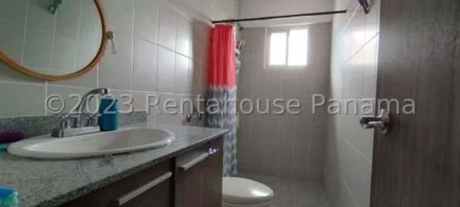 Contemporary bathroom with granite counter, window lighting PH Sunshine By The Park Panama City