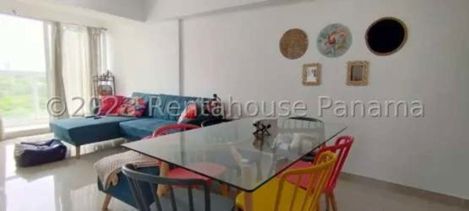 Modern dining and living open plan, wall art, natural light PH Sunshine By The Park Panama City