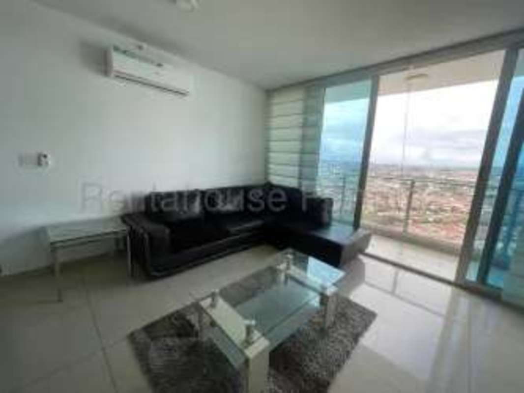 Modern living room with balcony, large windows and city views in Costa View Tower Costa del Este Panama