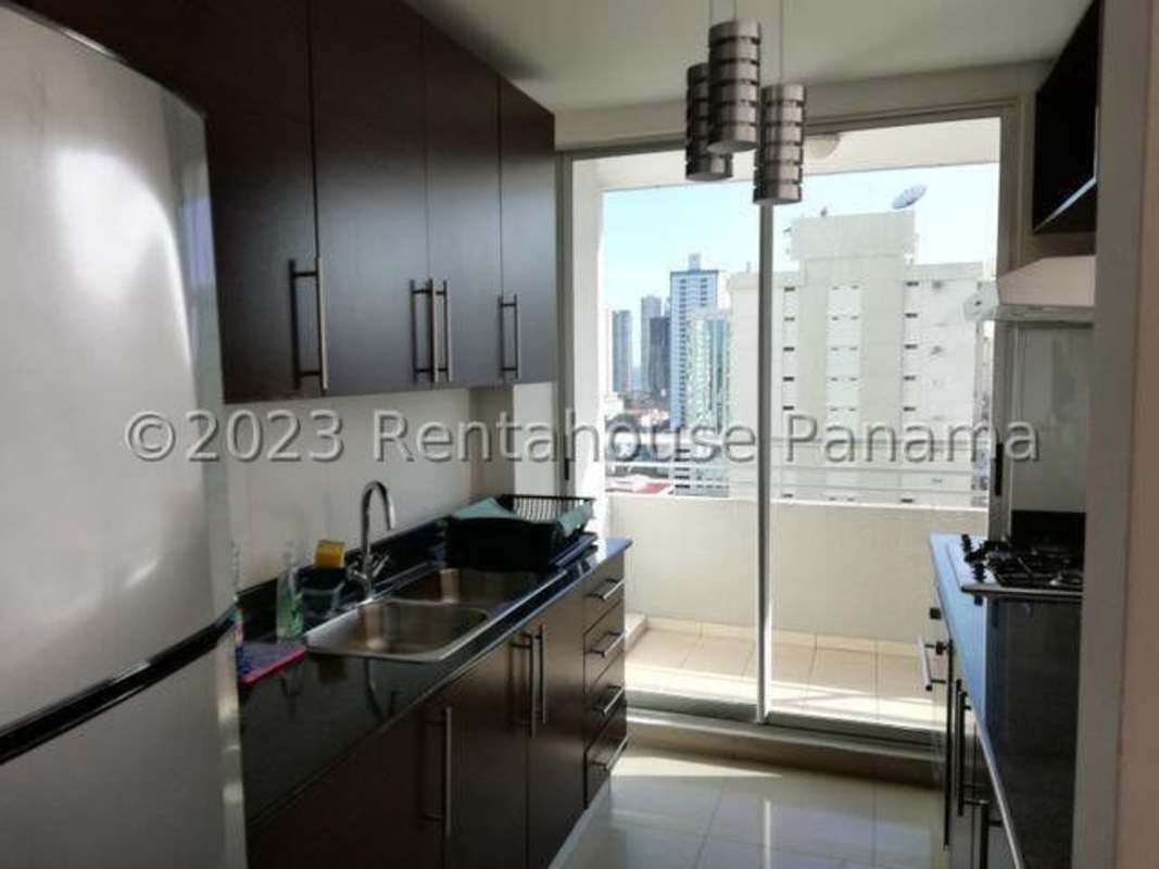 Bathroom with granite counter, large mirror, glass enclosed shower at PH Citrus San Francisco Panama