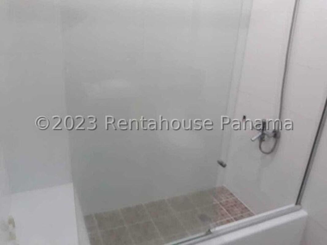 Contemporary bathroom with glass shower, granite countertop and porcelain tiles at PH Citrus