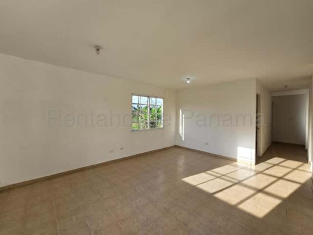 Empty bedroom with white walls and tile flooring in Pacora house for sale Panama