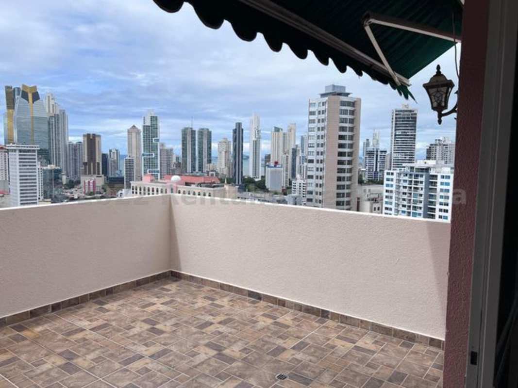 Large master bedroom with city views dual walk-in closets PH Aurora Tower