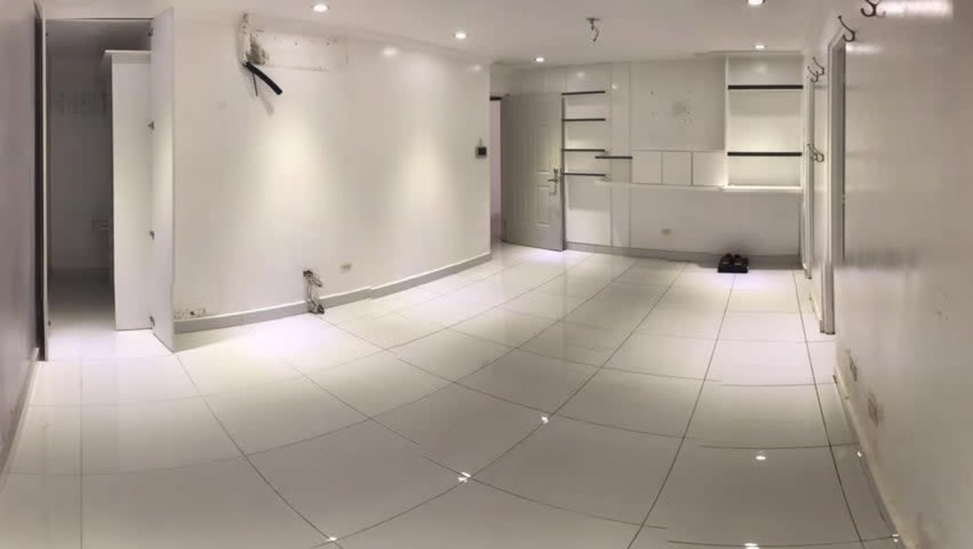 Modern compact bathroom with glass enclosure and pedestal sink Brisas del Golf Panama