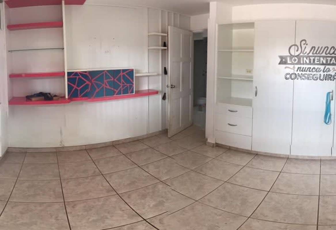 Bedroom in suburban house with tiled floors and built-in closet Brisas del Golf Panama