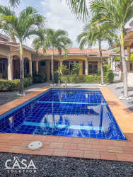 Spacious furnished living and dining room with tile floors PH Cuesta del Sol David Panama