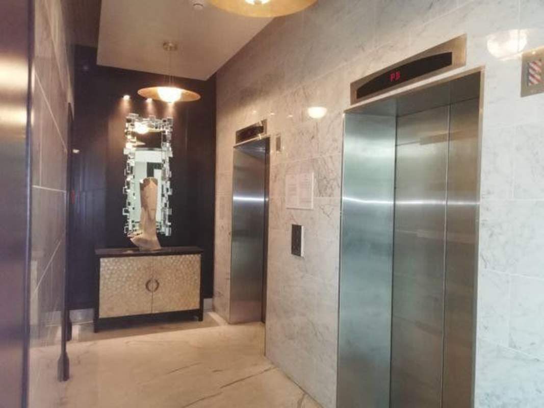 Modern kitchen with granite island and appliances in PH Costa Real Costa del Este