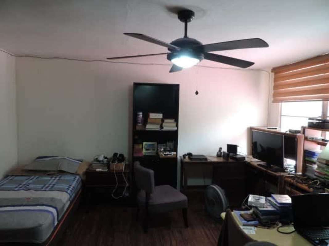 Dining room with six-seat table, large window, AC in multi-level Villa de las Fuentes house Panama